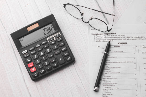 istock Black calculator on texture background stock image. 1322984956