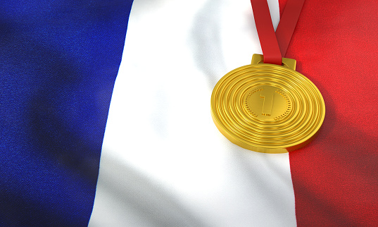 France flag and gold medal. International games and winning concept.