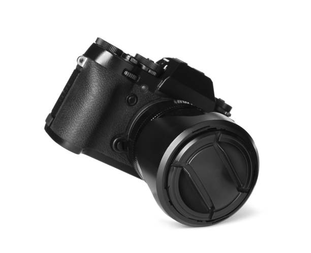 istock Modern digital camera isolated on white. Photography equipment 1322989753