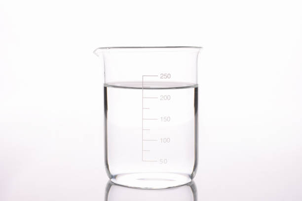 istock Sterilized water is poured into measuring glass closeup 1322990285