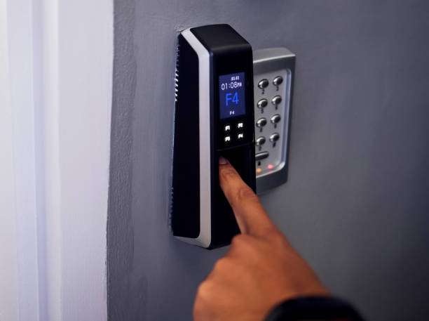 istock Shot of an unrecognizable man using his finger to gain access into a building 1322990680