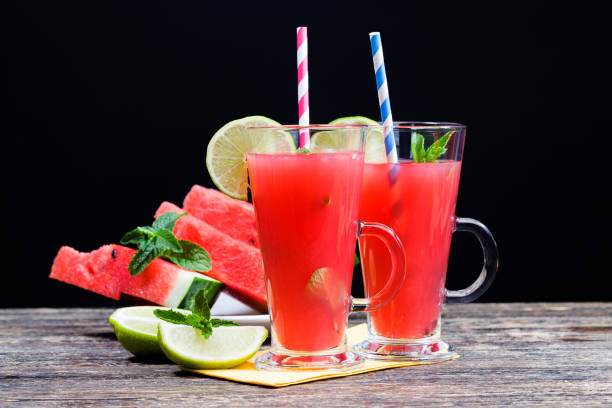 istock a table with food and red ripe watermelons 1322990784