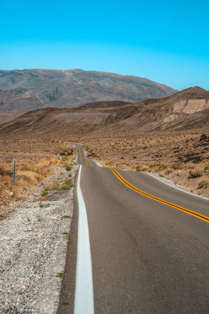 istock Empty infinite Road in the Desert in Death Valley, USA 1322990861