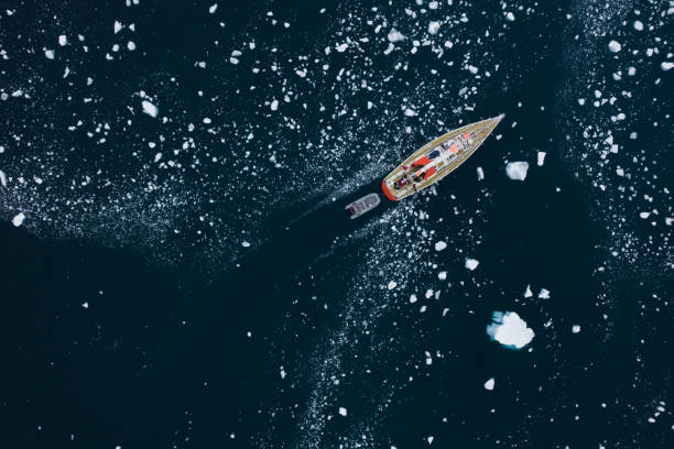 istock Sailing boat expedition among ice in Antarctica 1322993566