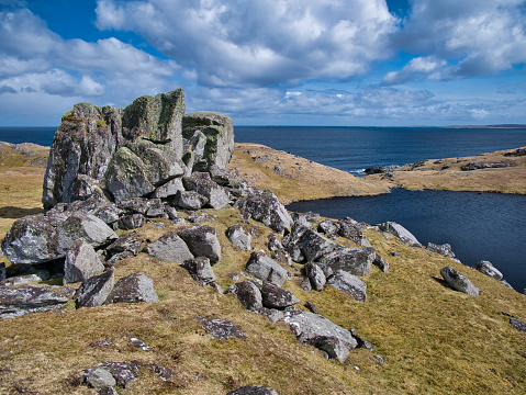 The Stanes or Stones of Stofast on Lunna Ness, Shetland, UK - the stones are large glacial erratics on a hillside near Stofast, formed by the collapse of a nunatak