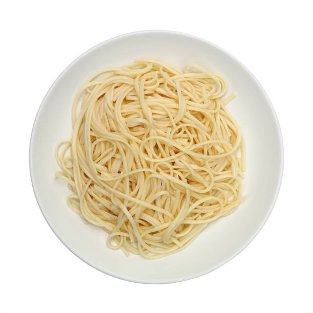 istock linguine pasta on circle white plate isolated on white 1322995004