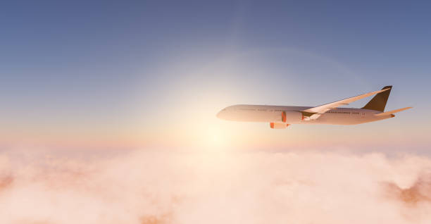 Commercial airplane flying above clouds