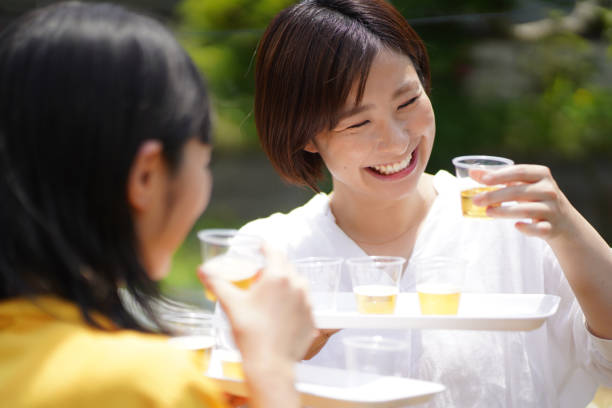 istock Woman tasting beer 1322995791