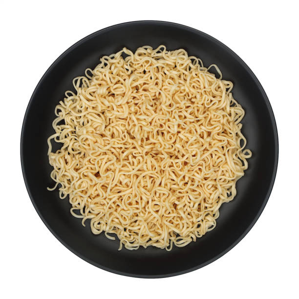 istock instant noodles on circle black plate isolated on white 1322996286