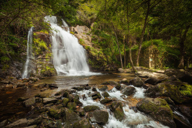 istock Natural Cabreia waterfall in Portuguese forest 1322997512