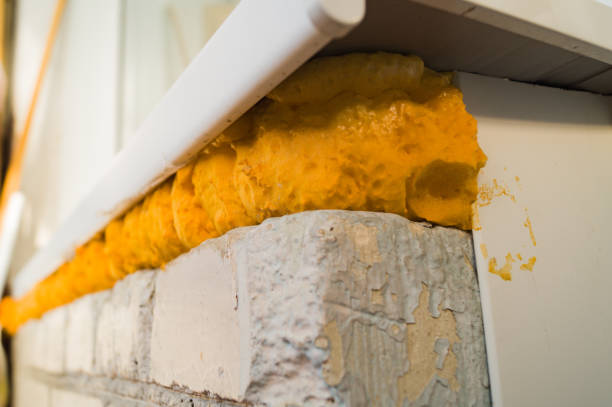 istock Polyurethane foam is used to install a plastic window. 1322998922