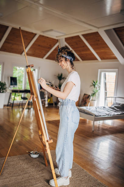 istock Young female artist working 1323000290