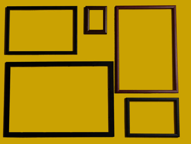 istock Empty picture frames on different colored background, on the wall, on the shelf, abstract, wooden frames. 1323003372