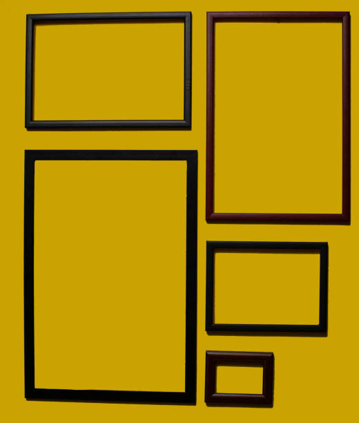 istock Empty picture frames on different colored background, on the wall, on the shelf, abstract, wooden frames. 1323003378