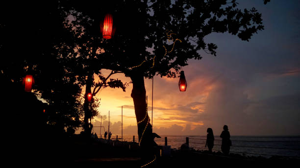 istock enjoying the kuta's beach sunset, bali 1323004530