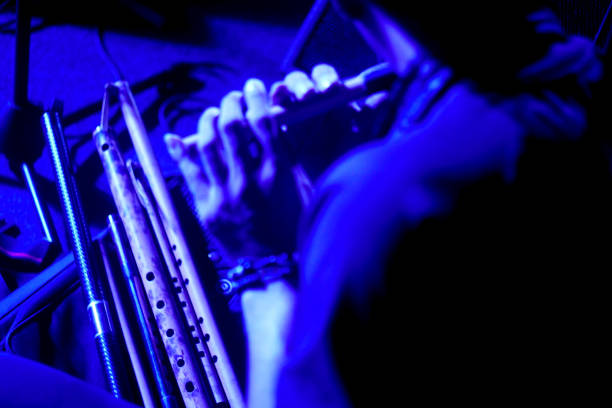 istock musician playing the bamboo flute 1323004664