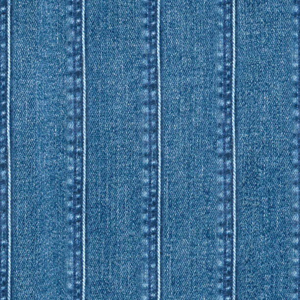 istock Jeans patchwork fashion background. Denim blue grunge textured seamless pattern 1323005507