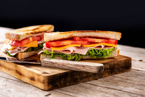 istock Sandwich with tomato,lettuce,ham and cheese 1323007220
