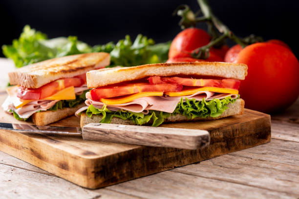 istock Sandwich with tomato,lettuce,ham and cheese 1323007233