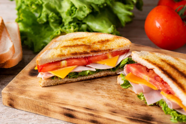istock Sandwich with tomato,lettuce,ham and cheese 1323007247