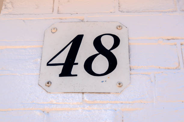 istock Close Up House Number 48 At Amsterdam The Netherlands 1323007455