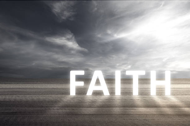 istock Faith text on wooden table 1323008015