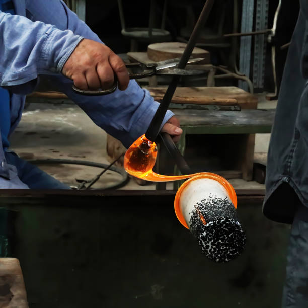 istock Skilled artisans work glass in Murano, Venice 1323018370