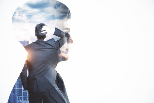 istock Success concept. Thoughtful young man in office isolated on white background with mockup space. Double exposure. 1323020223