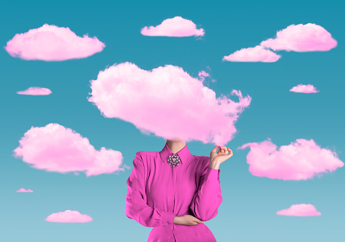Elegant woman in pink surrounded with pink clouds, and her head is in a pink cloud as well. 
Concepts: Lady, luxury, living in illusions, pleasure-seeking.
