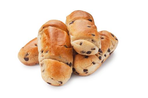 Studio shot of chocolate chip brioche cut out against a white background