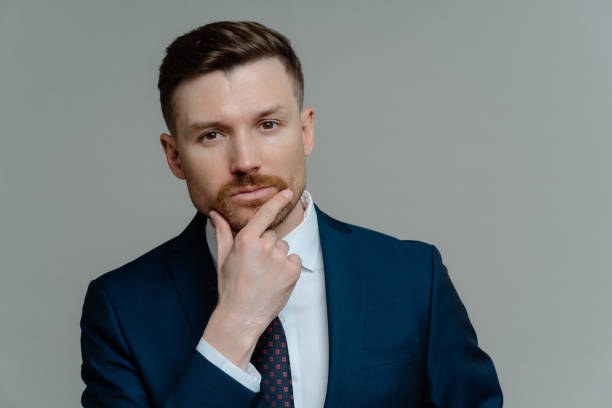 istock Confident handsome male entrepre thinking about business 1323028642