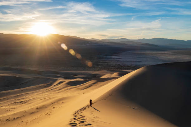 istock Walking on Eureka Sand Dunes at Sunset 1323029941
