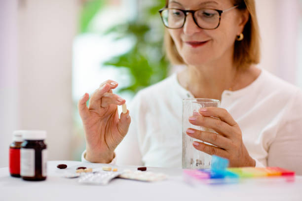 istock Pill box for senior patient. Medicine container. 1323030215
