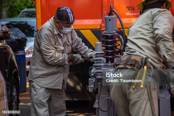Wiremen Electrical Wireman Are Stripping Wires Before Install A Transformer On ...