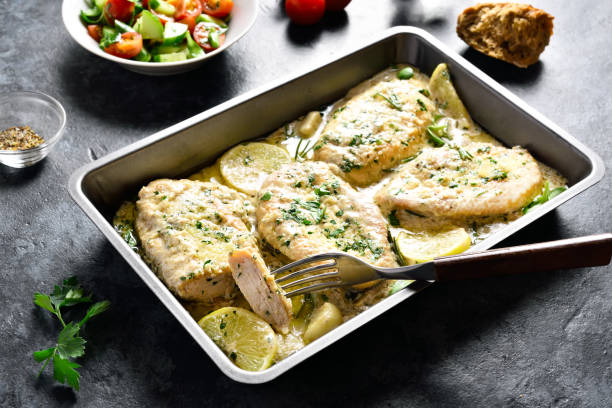 istock Chicken breast in creamy garlic sauce 1323031558