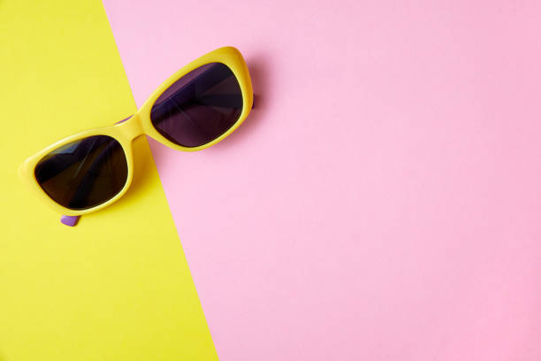 istock Sunglasses on minimal colorful background with copy space 1323032337