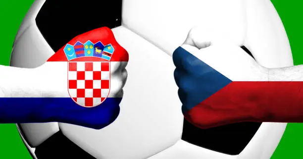 Flags of Czech Republic and Croatia painted on two clenched fists facing each other with closeup 3d football soccer ball in the background. Mixed media football match game concept