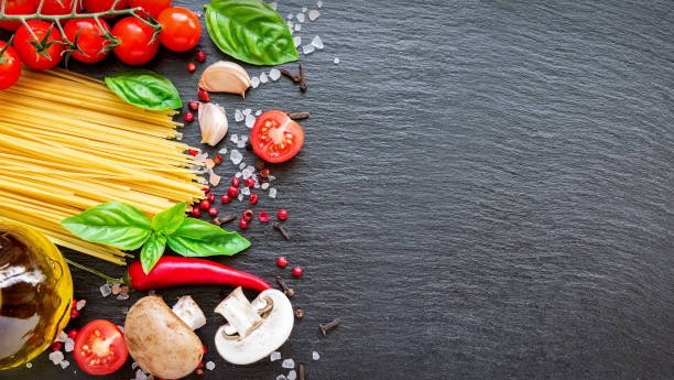 istock Food ingredients on dark background. 1323033603