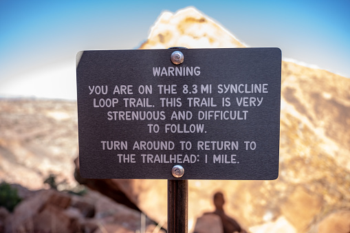 Warning Sign on Syncline Loop Trail in Canyonlands National Park