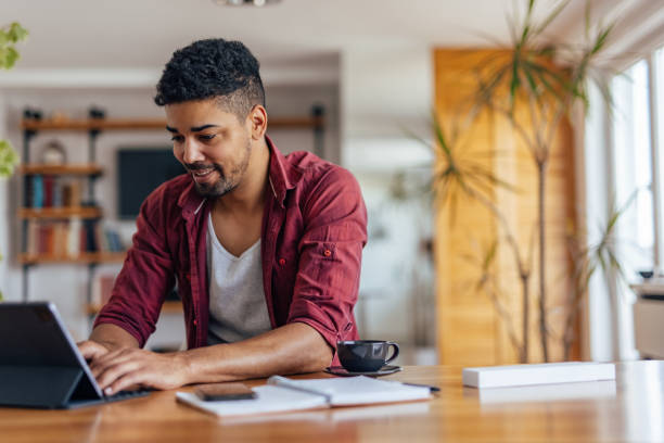 istock Adult man, writing in his diary on regular basis. 1323035221