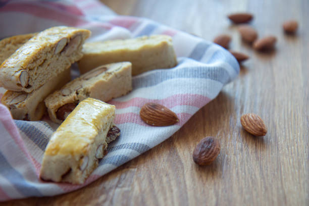 istock Biscotti cookies and almonds on wooden background 1323036506