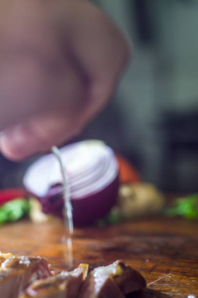 istock pork on the table with lemon and vegetables 1323039402