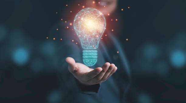 istock Businessman holding drawing glowing lightbulb, creative thinking ideas and innovation concept. 1323040099