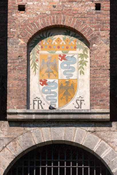 coat of arms of the visconti family close up - milan italy italy castello sforzesco color image imagens e fotografias de stock