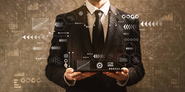 istock Technology screen with grid with businessman holding a tablet co 1323050355