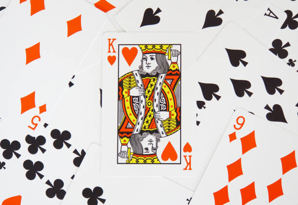 istock Lots of scattered playing cards. 1323054248