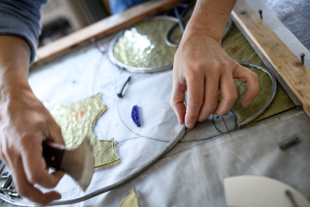 istock Glass artist craftswoman working in her studio 1323058101