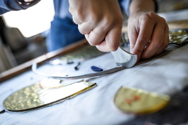 istock Glass artist craftswoman working in her studio 1323058159