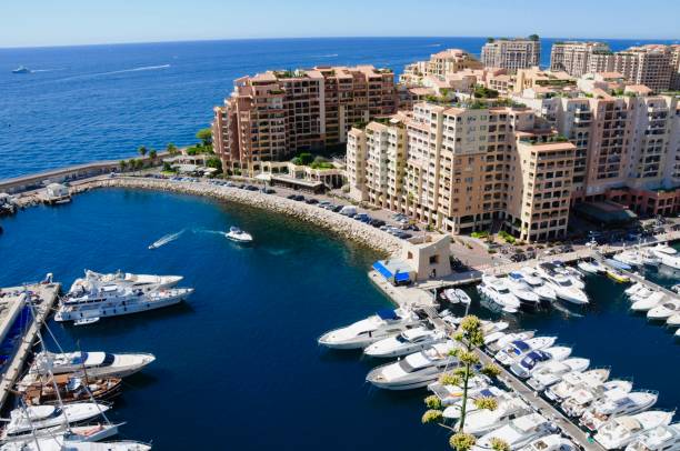 Aerial view of Fontvieille and Monaco harbor with luxury yachts.