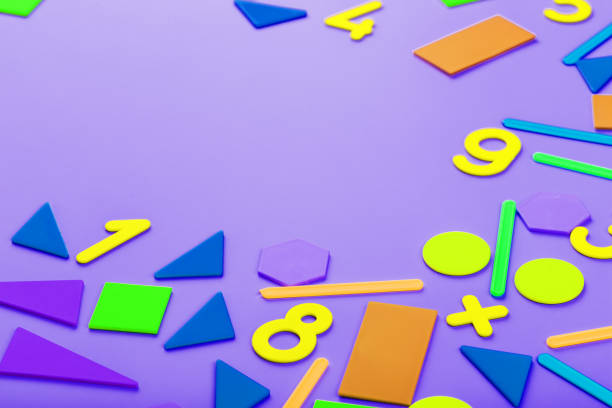 istock Colorful figures and numbers for children on a pink background. A tool for developing children's thinking. 1323061306
